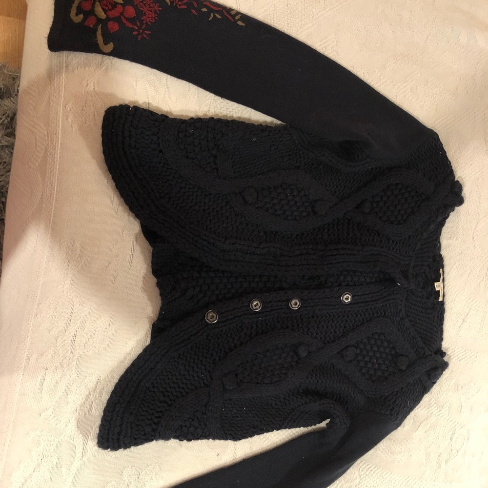 Hem and thread cardigan.